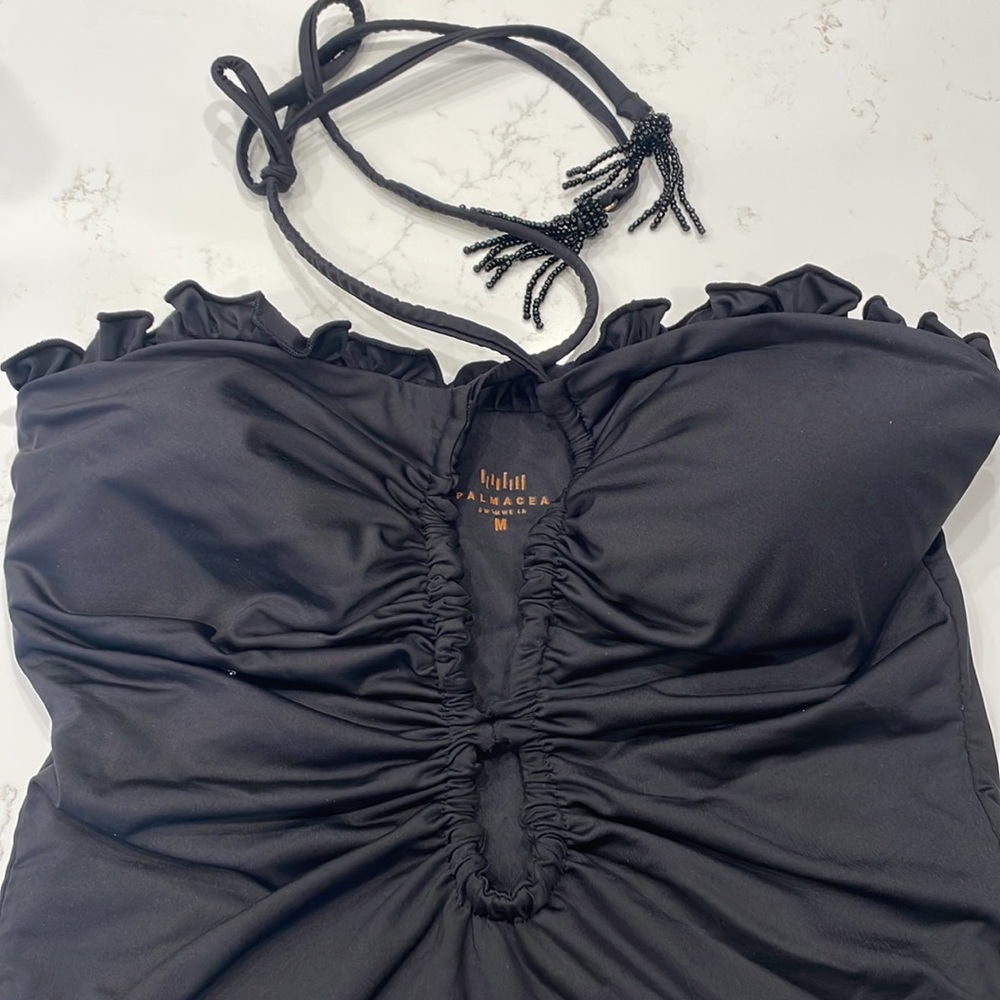 Palmacea, one piece, tied swimsuit with cut outs.  
Size M - Picture 2 of 12